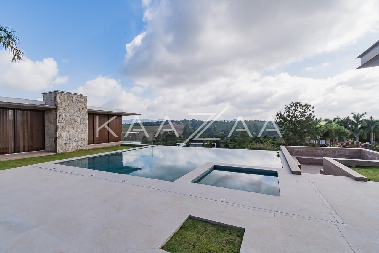 Um projeto de casa de campo feito para limpar a vista e se inspirar. No condomínio Quinta da Baroneza. - Foto 4