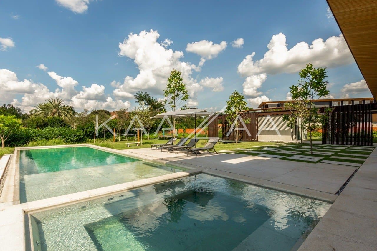Casa contemporânea feita para interagir com a natureza ao redor. Projeto na Quinta da Baroneza. - Foto 2