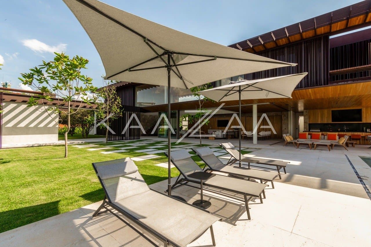 Casa contemporânea feita para interagir com a natureza ao redor. Projeto na Quinta da Baroneza. - Foto 4