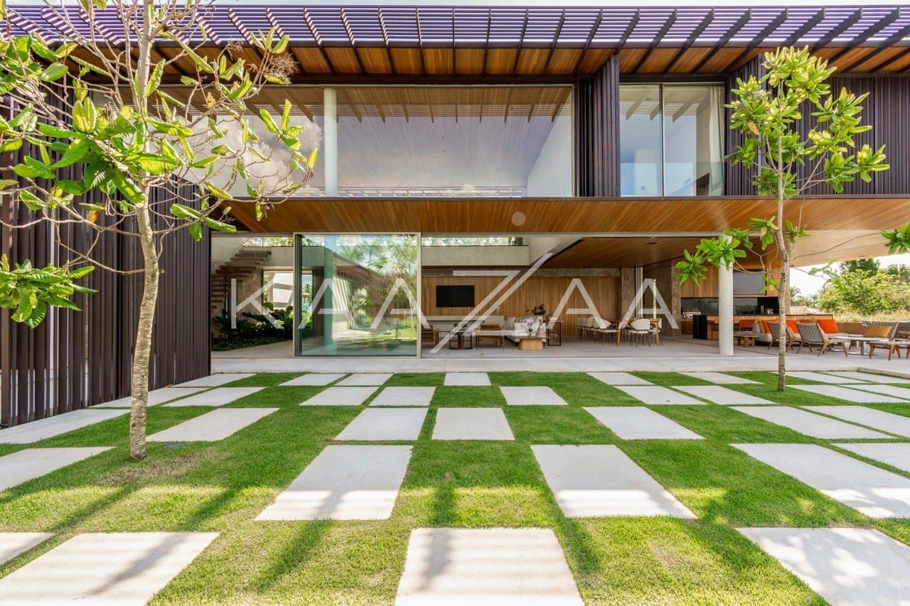 Casa contemporânea feita para interagir com a natureza ao redor. Projeto na Quinta da Baroneza. - Foto 7