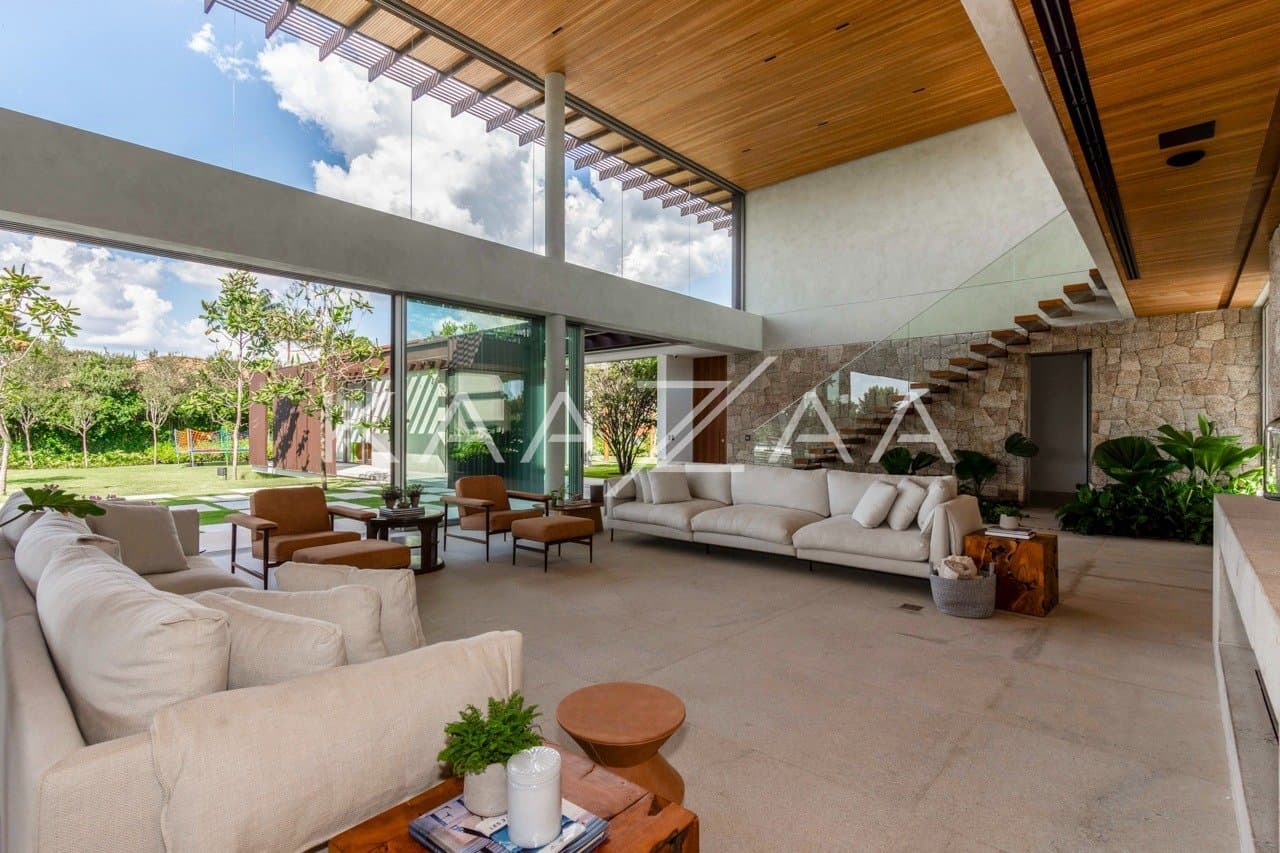 Casa contemporânea feita para interagir com a natureza ao redor. Projeto na Quinta da Baroneza. - Foto 17