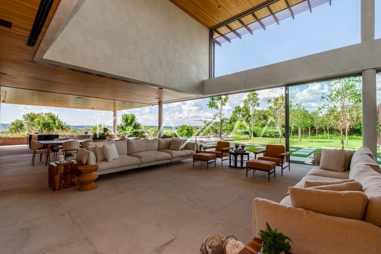 Casa contemporânea feita para interagir com a natureza ao redor. Projeto na Quinta da Baroneza. - Foto 15