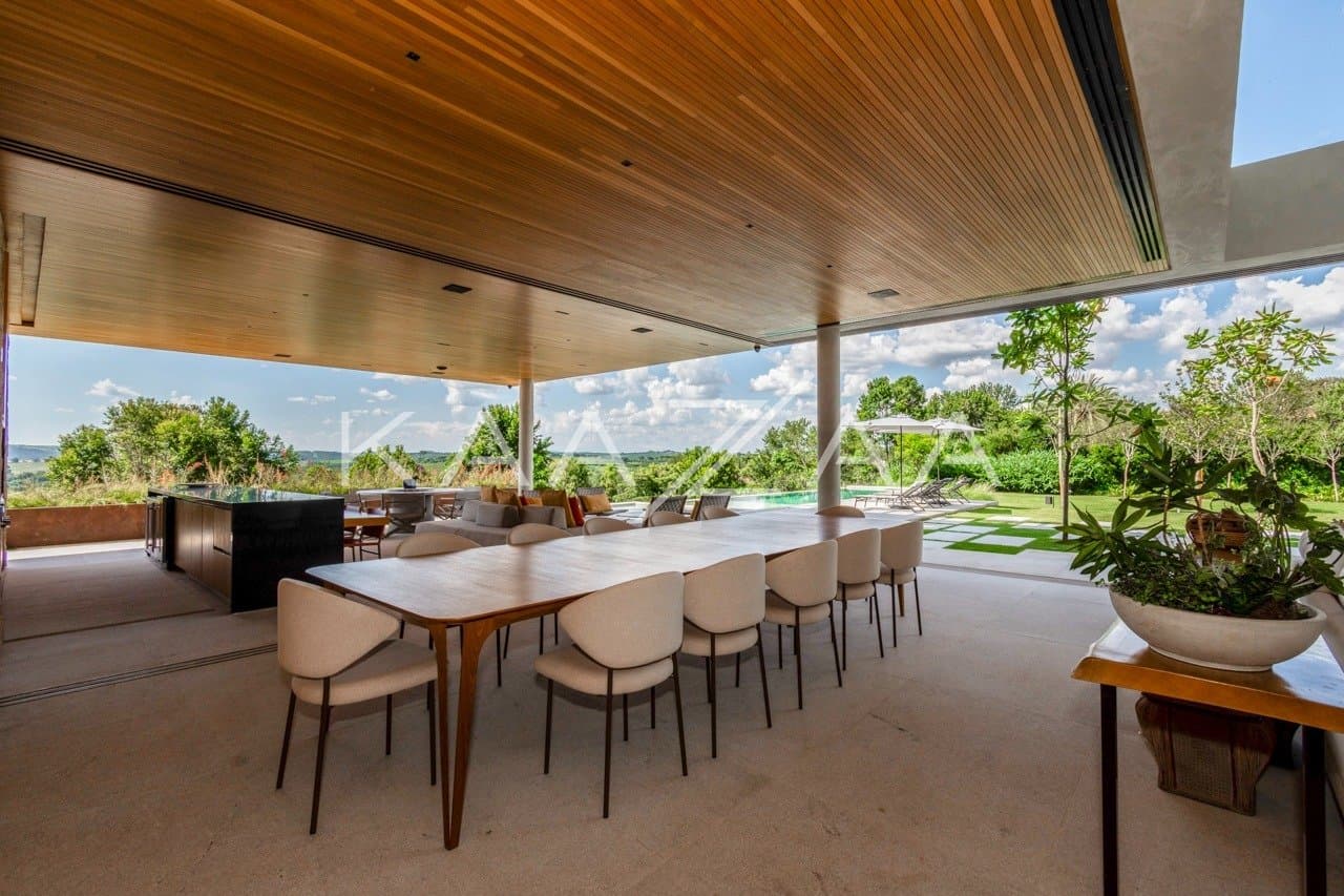 Casa contemporânea feita para interagir com a natureza ao redor. Projeto na Quinta da Baroneza. - Foto 18