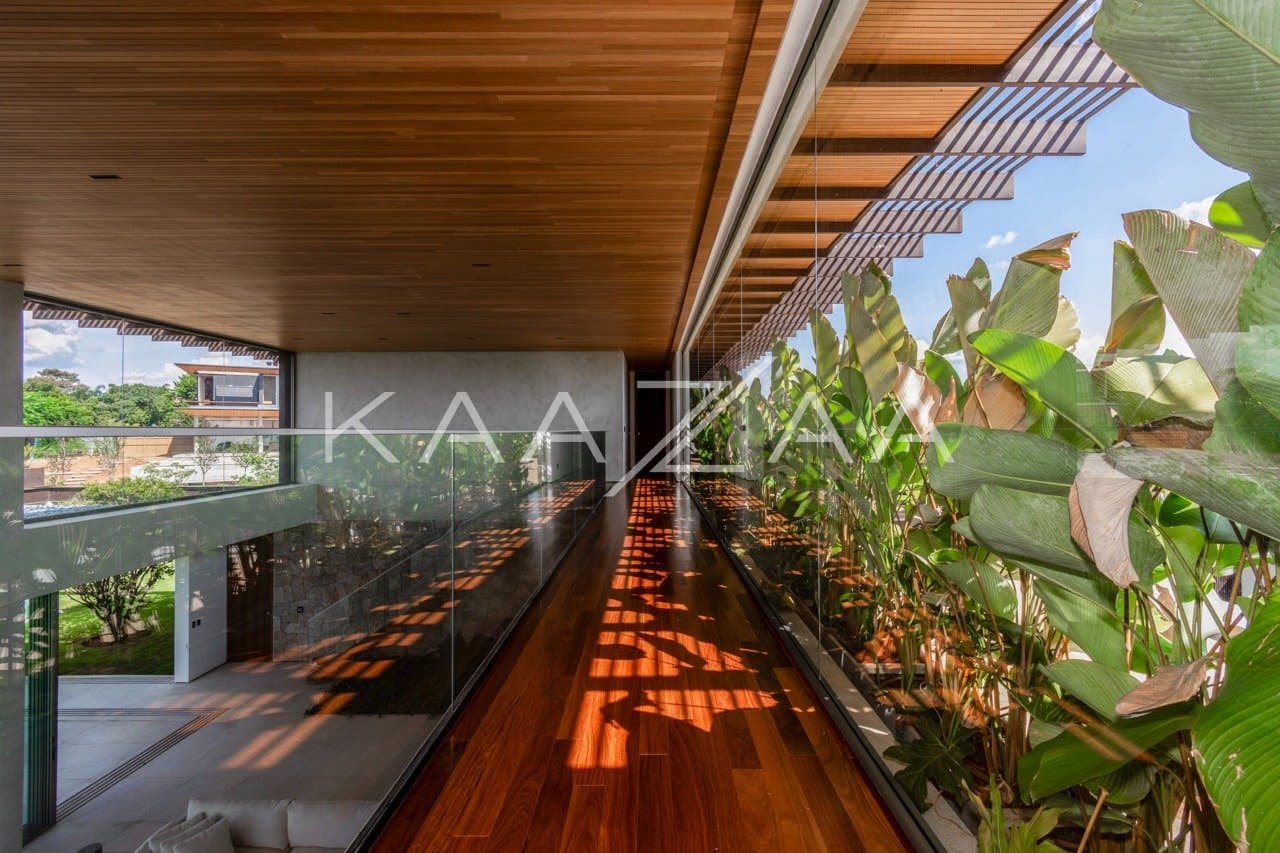 Casa contemporânea feita para interagir com a natureza ao redor. Projeto na Quinta da Baroneza. - Foto 21