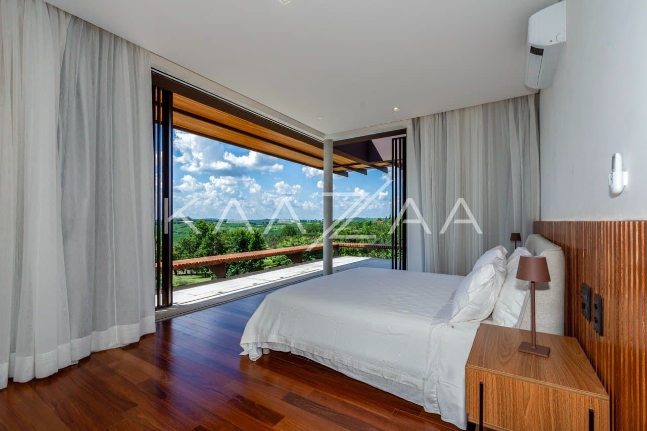 Casa contemporânea feita para interagir com a natureza ao redor. Projeto na Quinta da Baroneza. - Foto 22