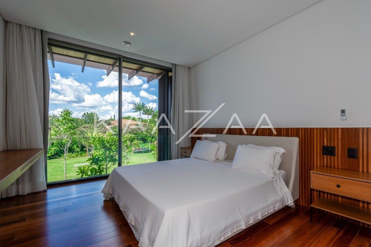 Casa contemporânea feita para interagir com a natureza ao redor. Projeto na Quinta da Baroneza. - Foto 26