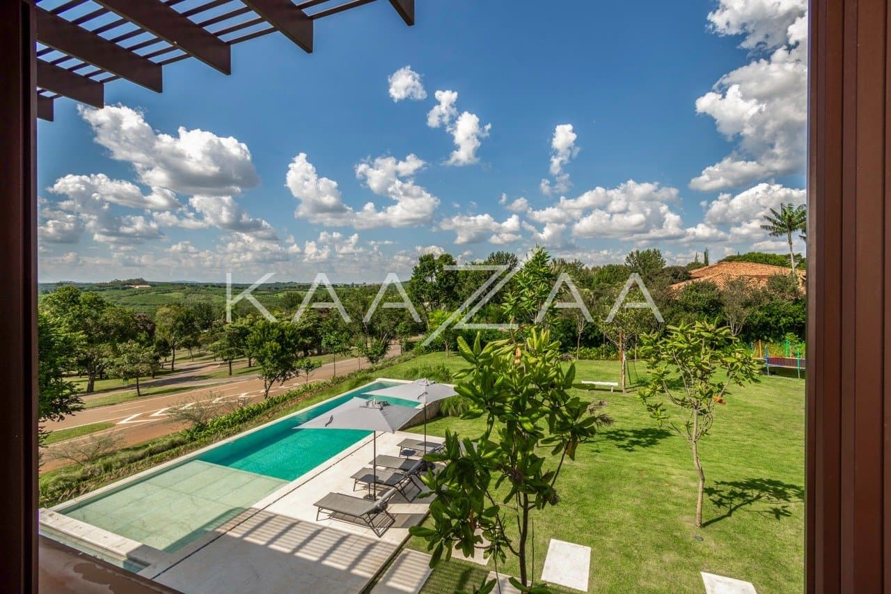 Casa contemporânea feita para interagir com a natureza ao redor. Projeto na Quinta da Baroneza. - Foto 28