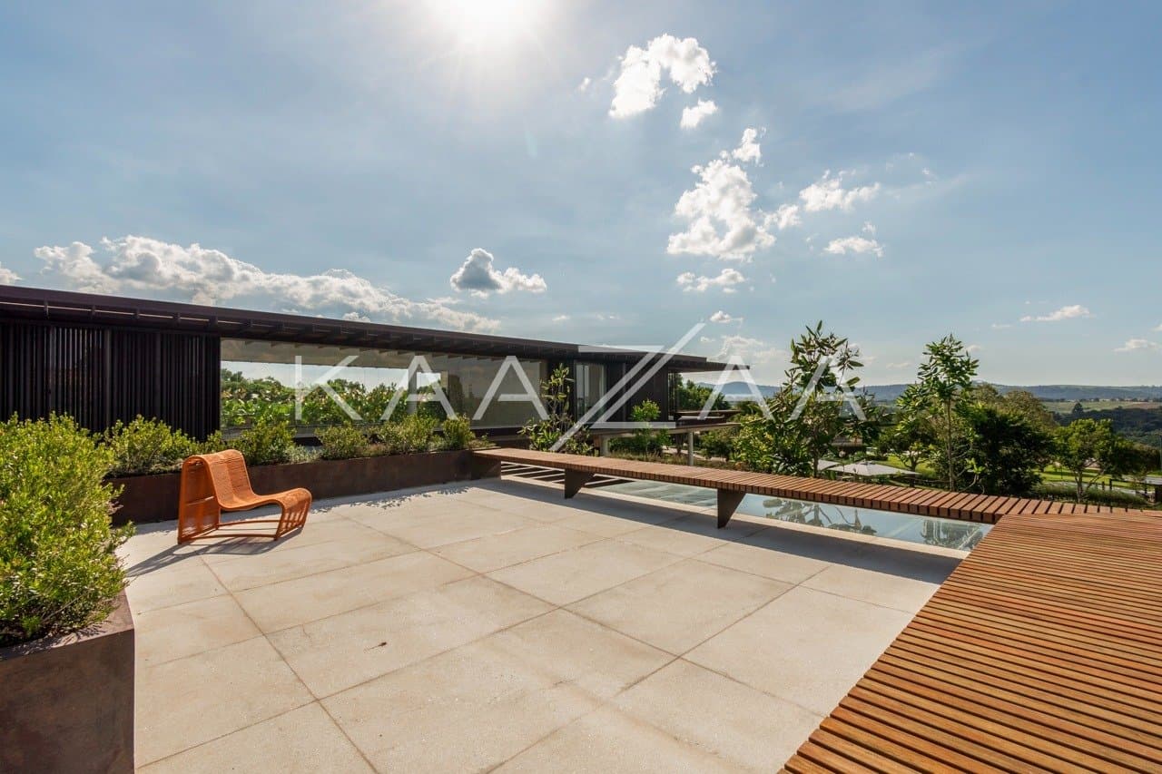 Casa contemporânea feita para interagir com a natureza ao redor. Projeto na Quinta da Baroneza. - Foto 30