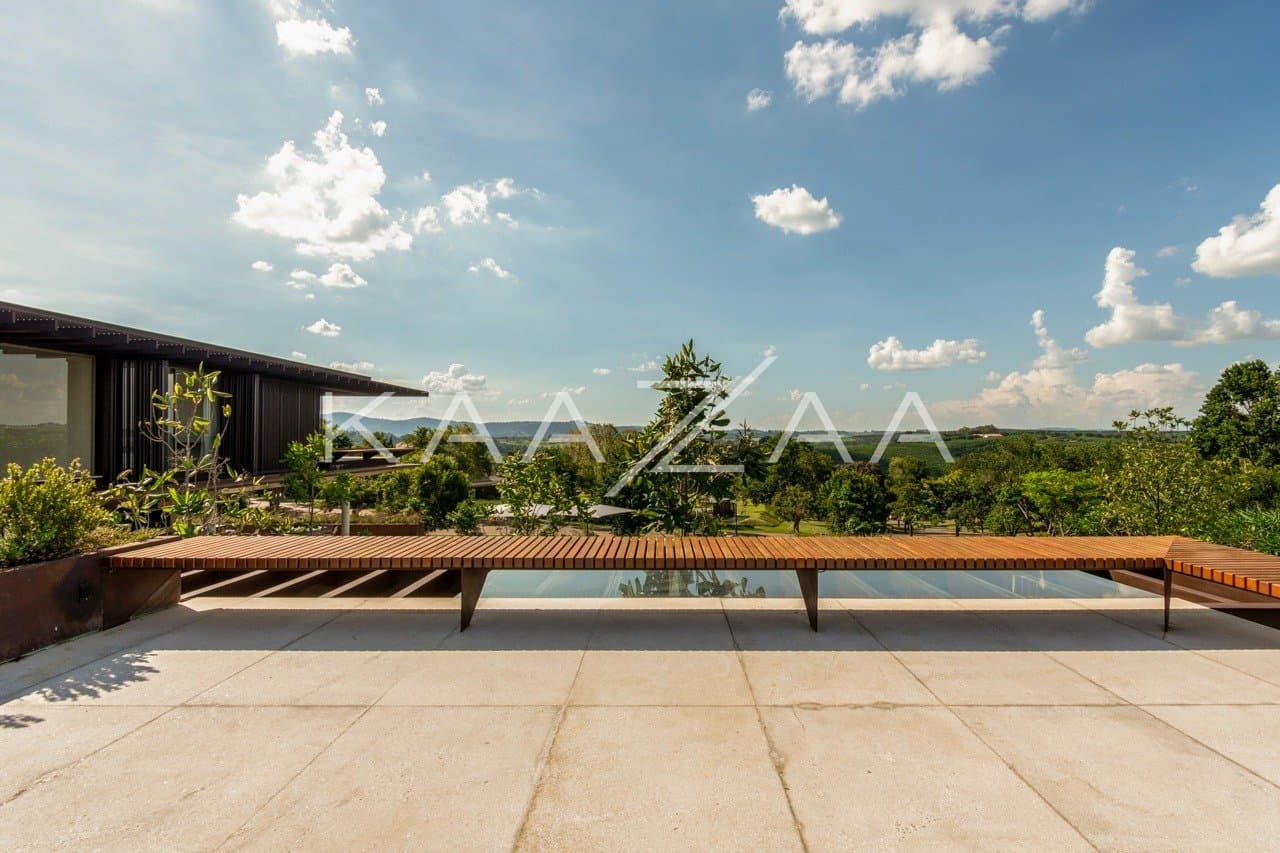 Casa contemporânea feita para interagir com a natureza ao redor. Projeto na Quinta da Baroneza. - Foto 31