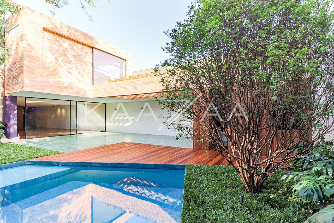 Design único e espaços cheios de personalidade nesta casa autoral no Jardim Paulista. - Foto 1