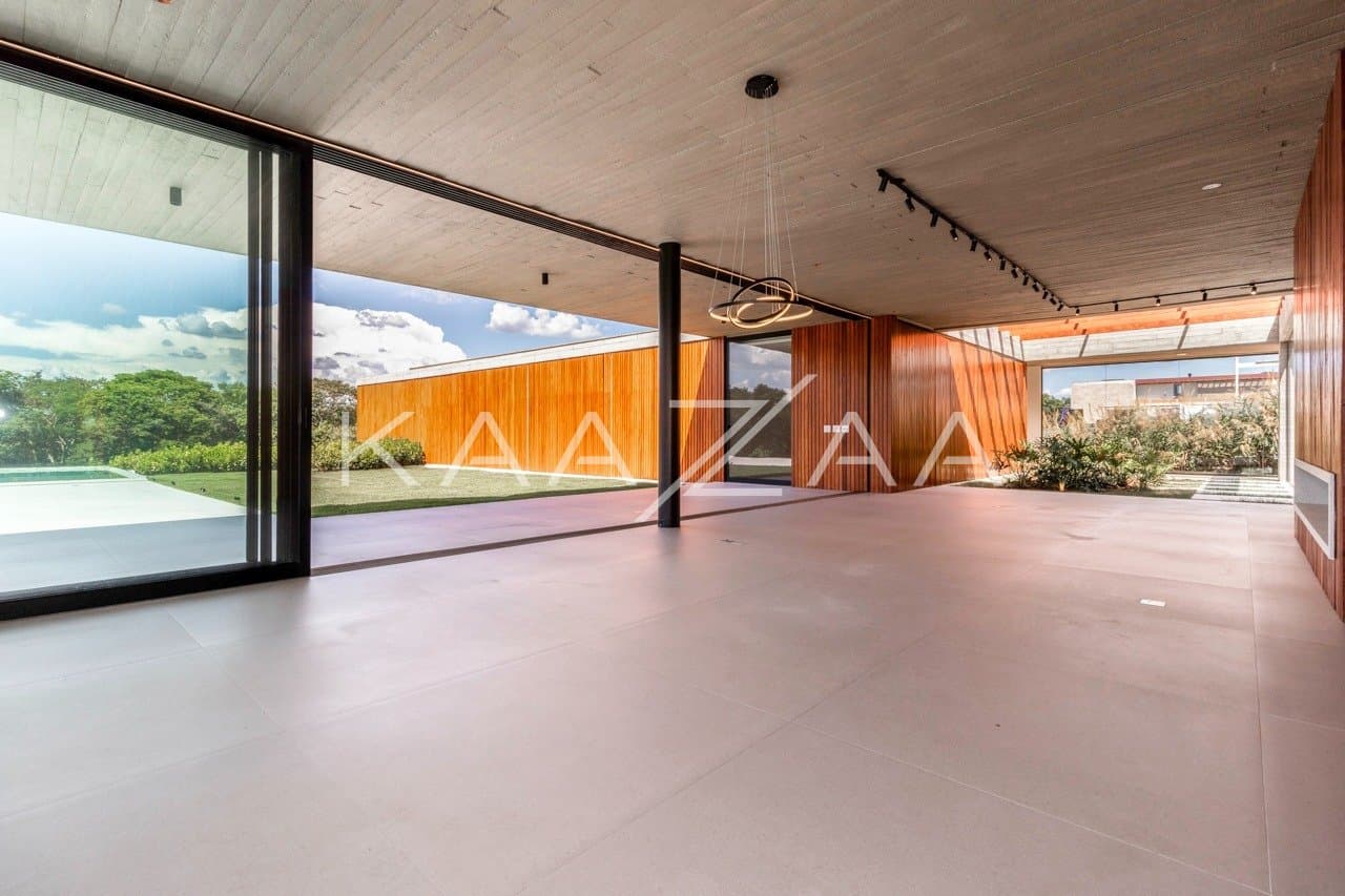 Casa em elegante diálogo com a natureza na Baroneza - Foto 10