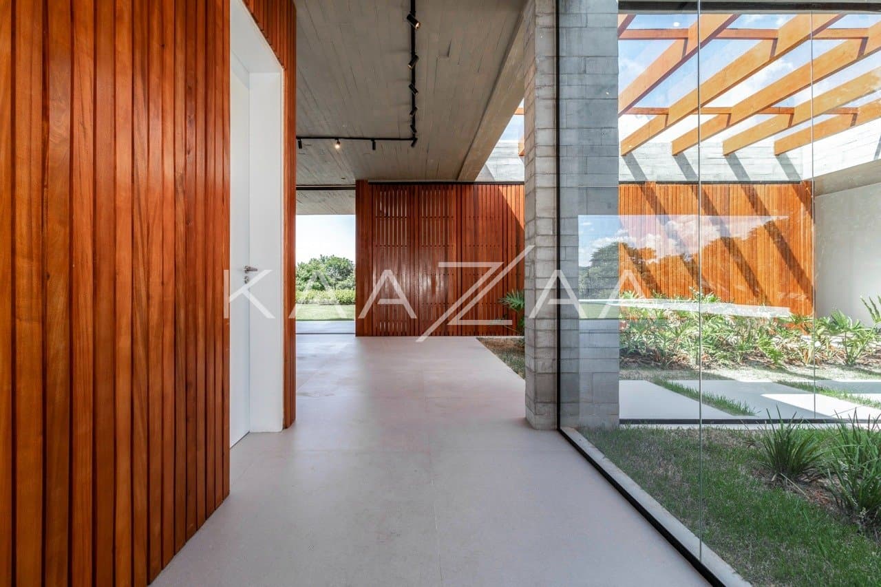 Casa em elegante diálogo com a natureza na Baroneza - Foto 11