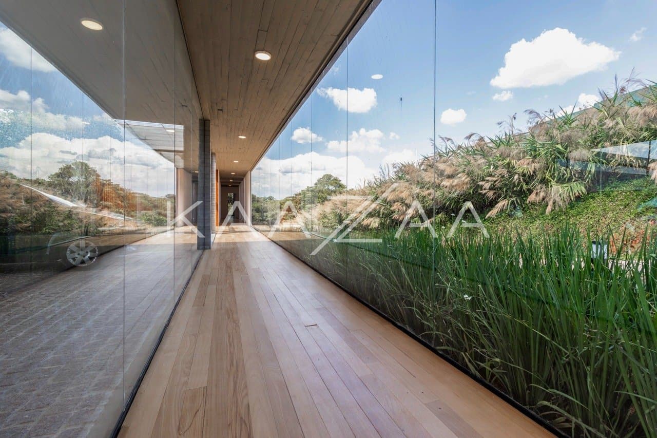 Casa em elegante diálogo com a natureza na Baroneza - Foto 12