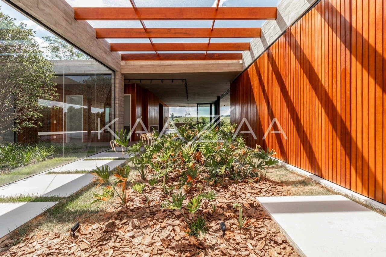 Casa em elegante diálogo com a natureza na Baroneza - Foto 23