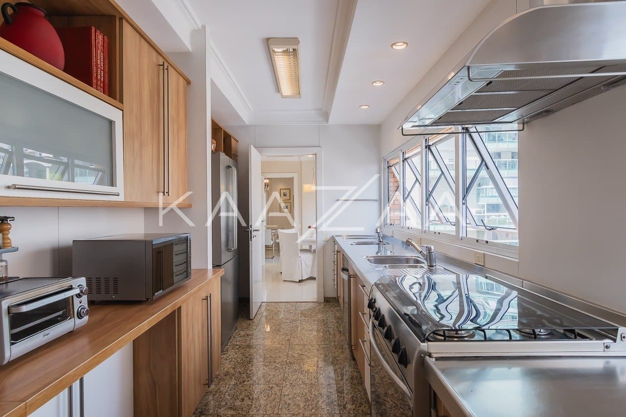 Harmonia clássica e moderna neste apartamento em Moema. - Foto 13